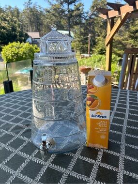 Tall lighthouse glass beverage dispenser